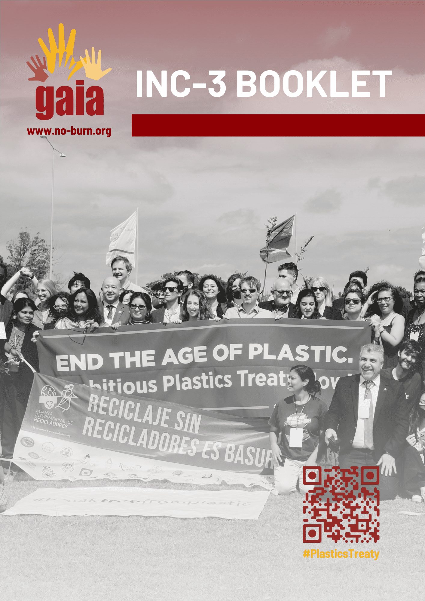 booklet cover with picture of people holding banner.