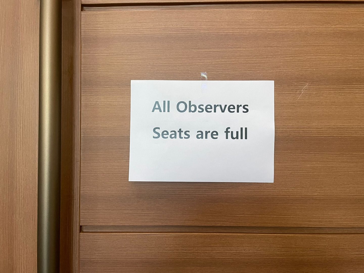 closed door with a label that says: 