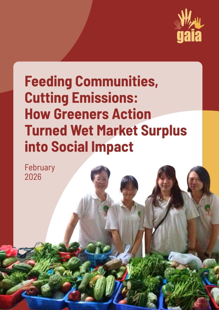 The image is a promotional flyer or digital cover for a report titled "Feeding Communities, Cutting Emissions: How Greeners Action Turned Wet Market Surplus into Social Impact."
Key Elements:
Header: Features the gaia logo and a "25th Anniversary 2000-2025" commemorative badge in white against a deep red, curved background.
Central Text: The title is written in bold, dark brown sans-serif font on a light beige rectangular block. Below the title, it says "February 2026".
Main Image: A group of four women wearing white polo shirts stands behind a long table overflowing with fresh green vegetables, including bitter melons, cucumbers, and leafy greens arranged in blue and red plastic crates.
Design: The composition uses organic, overlapping curved shapes in shades of dark red and gold on the right side. The background behind the women is a plain, solid white.
Would you like me to generate a similar editorial layout for a different social impact story?
