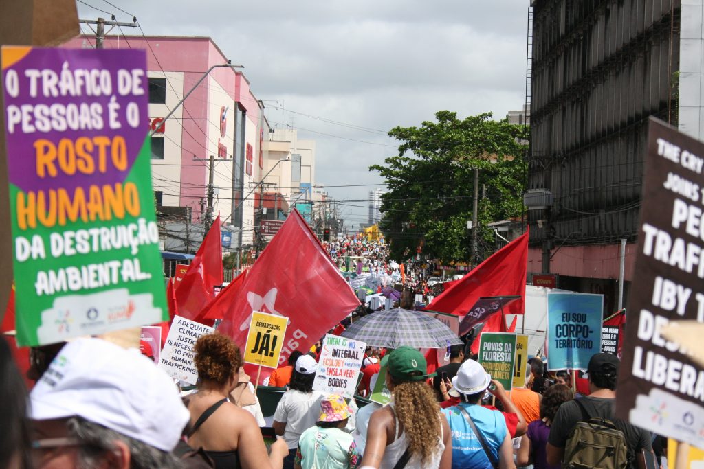 demonstration with people carrying signs